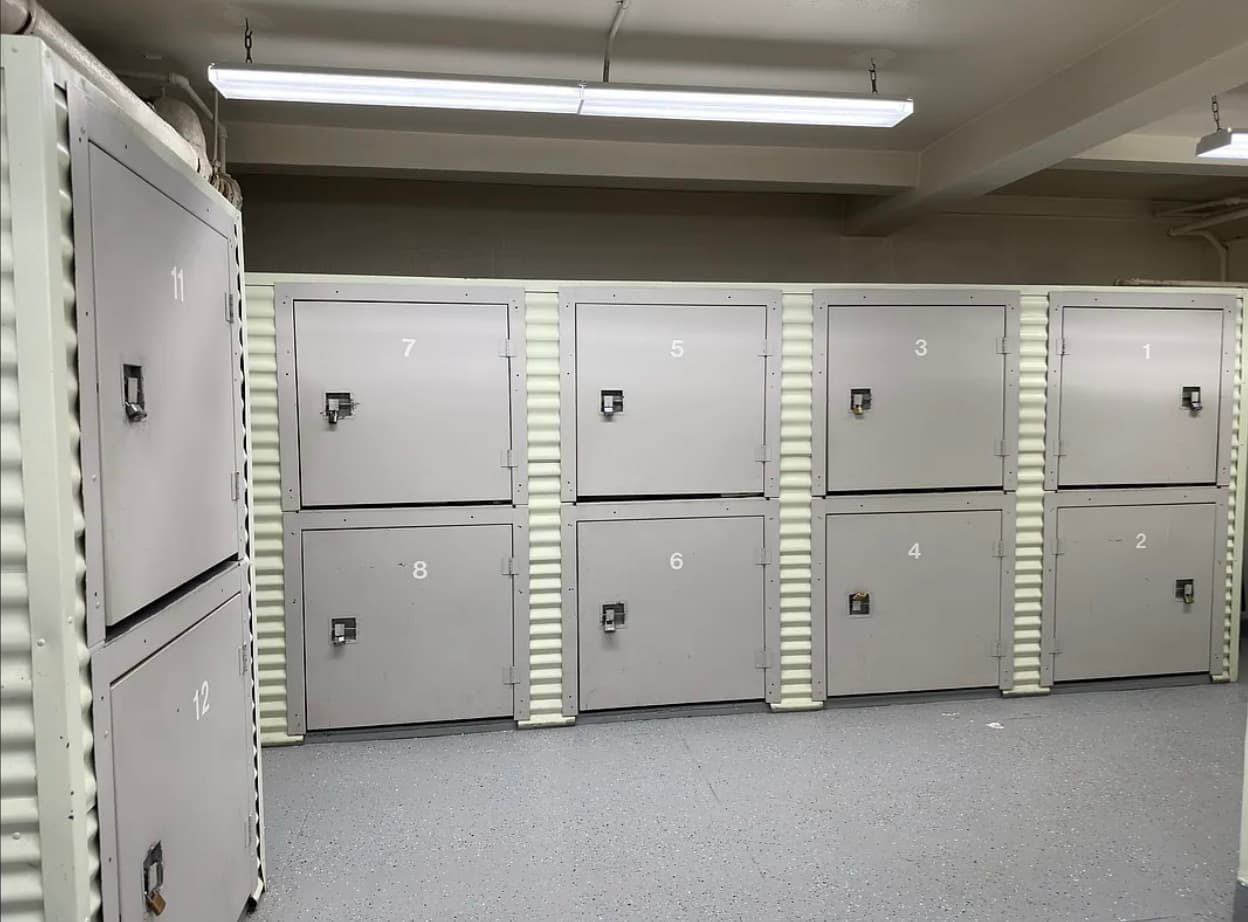 123 West 74th Street — the building's private basement storage room with individual numbered tenant storage lockers