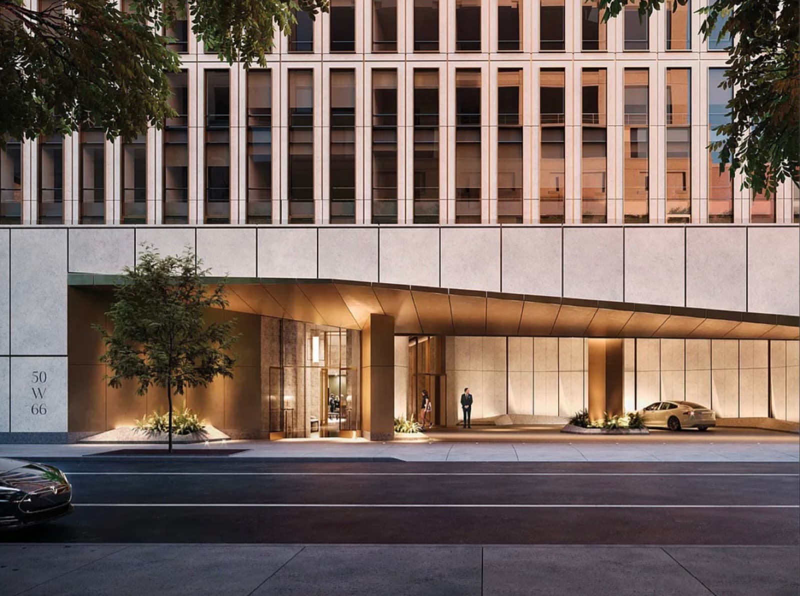 50 West 66th Street — the porte-cochere entrance beneath the limestone-and-bronze podium, with the building's 50 W 66 address plaque, a recessed drive-through motor court, and bronze-framed glass doors