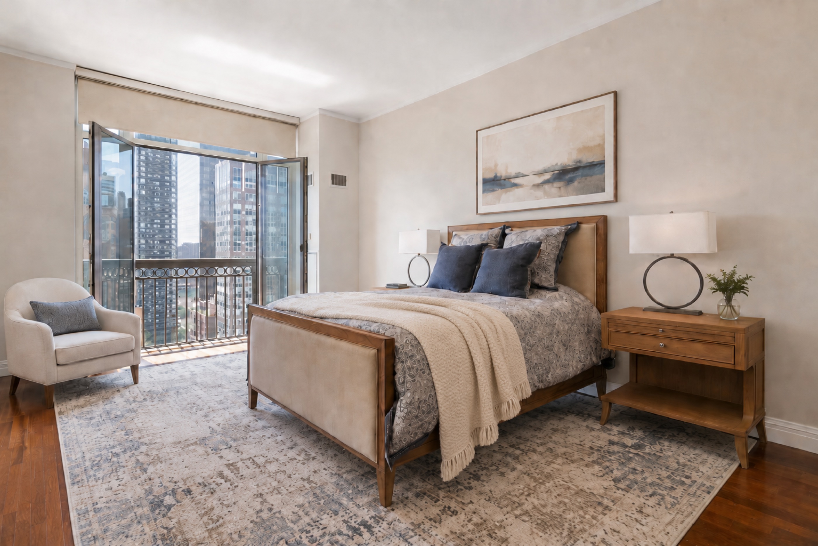 The primary bedroom, staged for the sale
